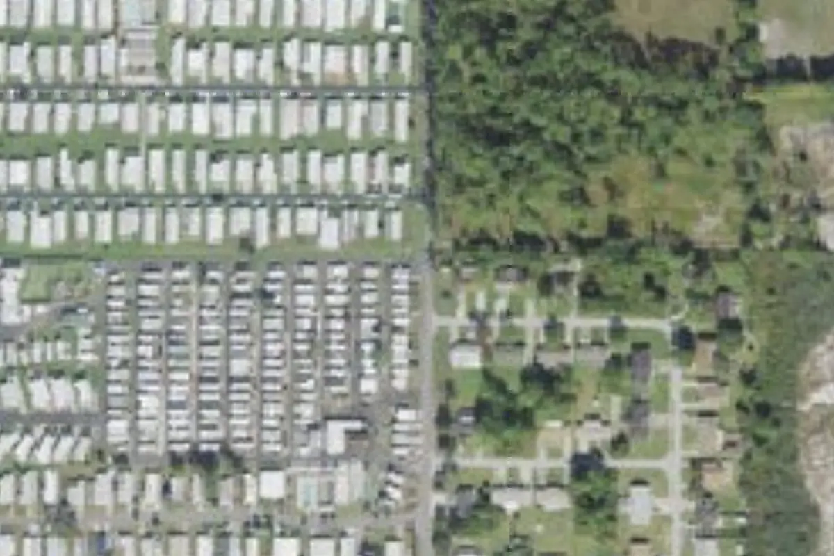 Aerial view of Whispering Pines Village Home & RV Park
